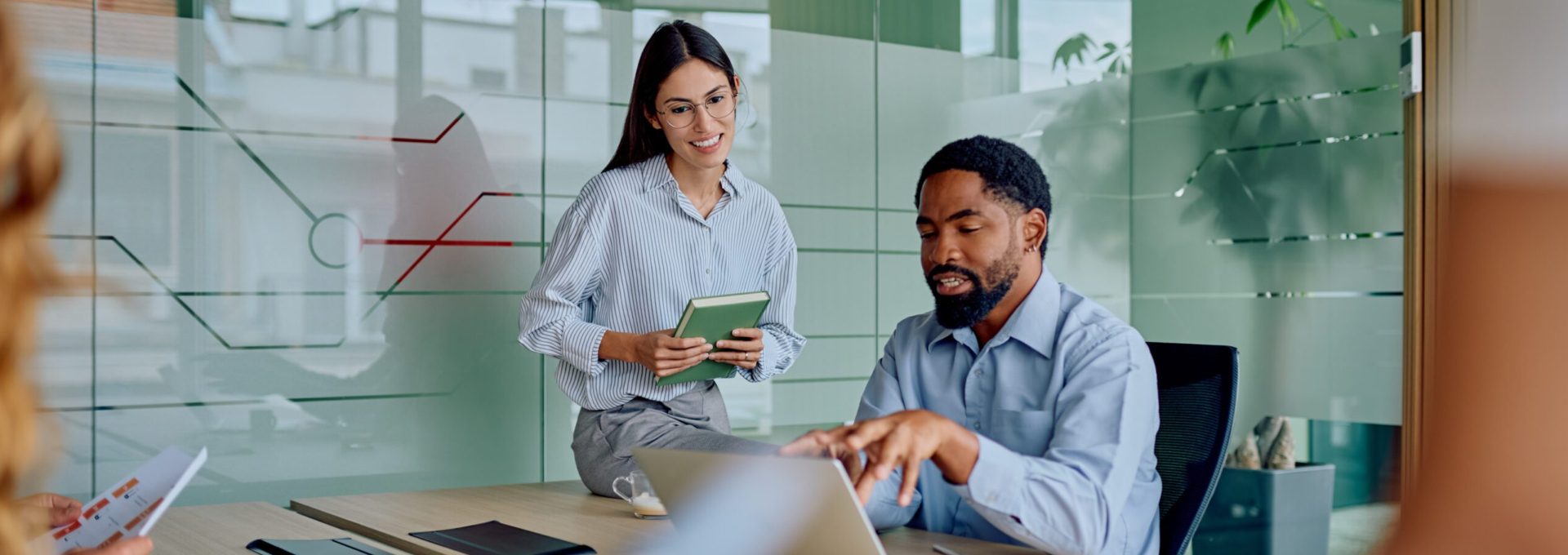 friendly employees discussing Employer of Record payrolling and contingent EOR terms